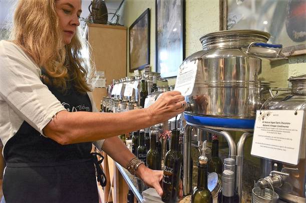 DSC_5762 The Happy Olive in Fairhope has developed a loyal following for its house-blends of olive oils, balsamic vinegars and mustards, which can be purchased by the bottle and jar or on tap. (Karim Shamsi-Basha / Alabama NewsCenter)