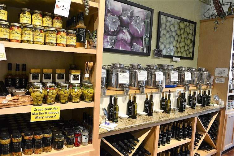 DSC_5770 The Happy Olive in Fairhope has developed a loyal following for its house-blends of olive oils, balsamic vinegars and mustards, which can be purchased by the bottle and jar or on tap. (Karim Shamsi-Basha / Alabama NewsCenter)