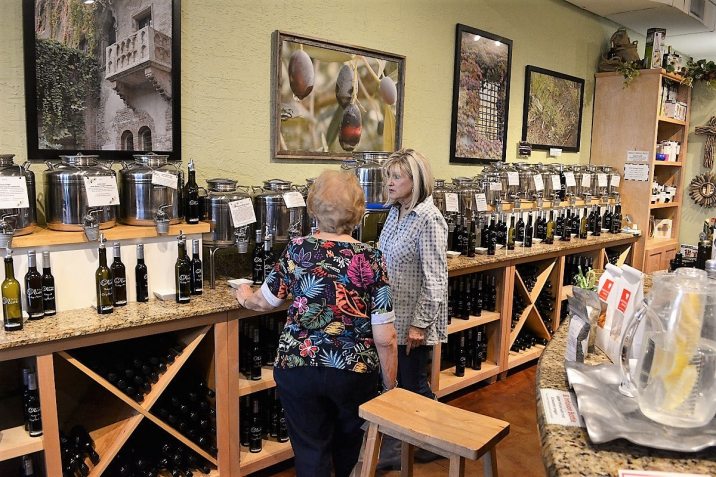 DSC_5774 The Happy Olive in Fairhope has developed a loyal following for its house-blends of olive oils, balsamic vinegars and mustards, which can be purchased by the bottle and jar or on tap. (Karim Shamsi-Basha / Alabama NewsCenter)