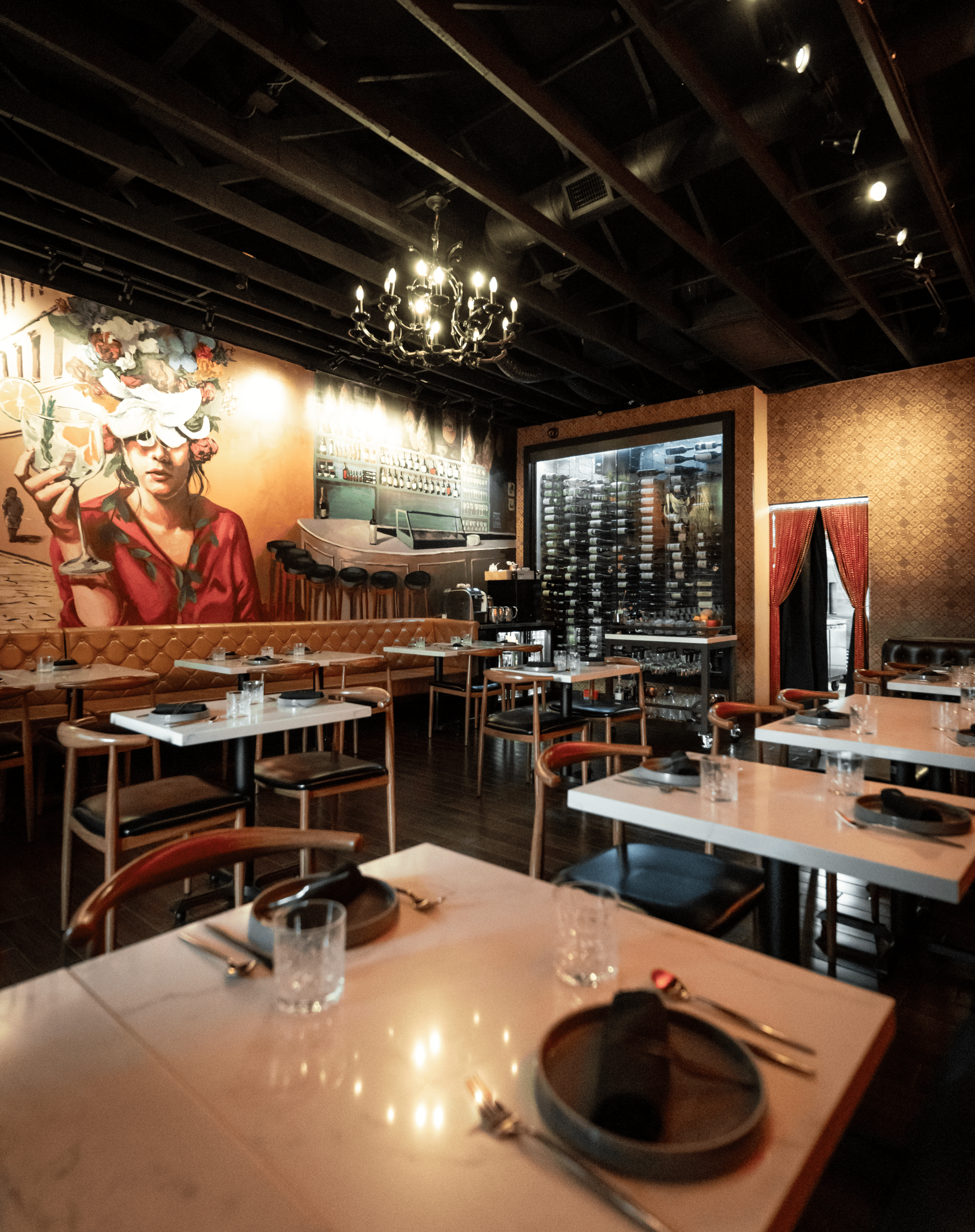 The interior of EDO with a mural on one wall.
