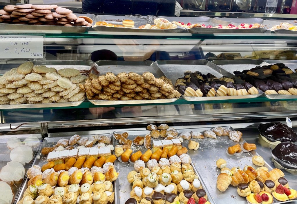 Pastries in display case at Regoli.