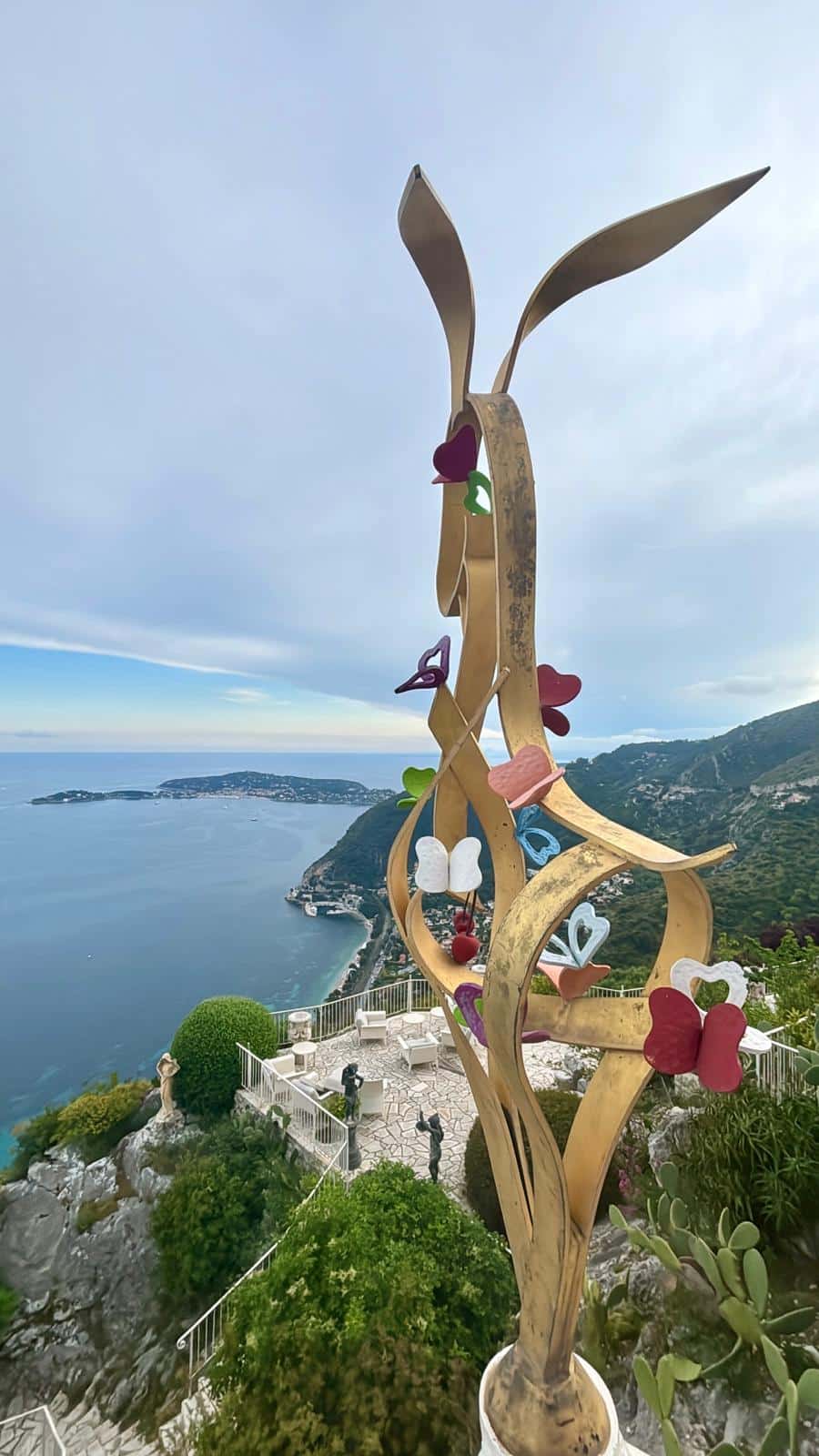The exterior of the La Chèvre d'Or restaurant in Eze with a sea view.