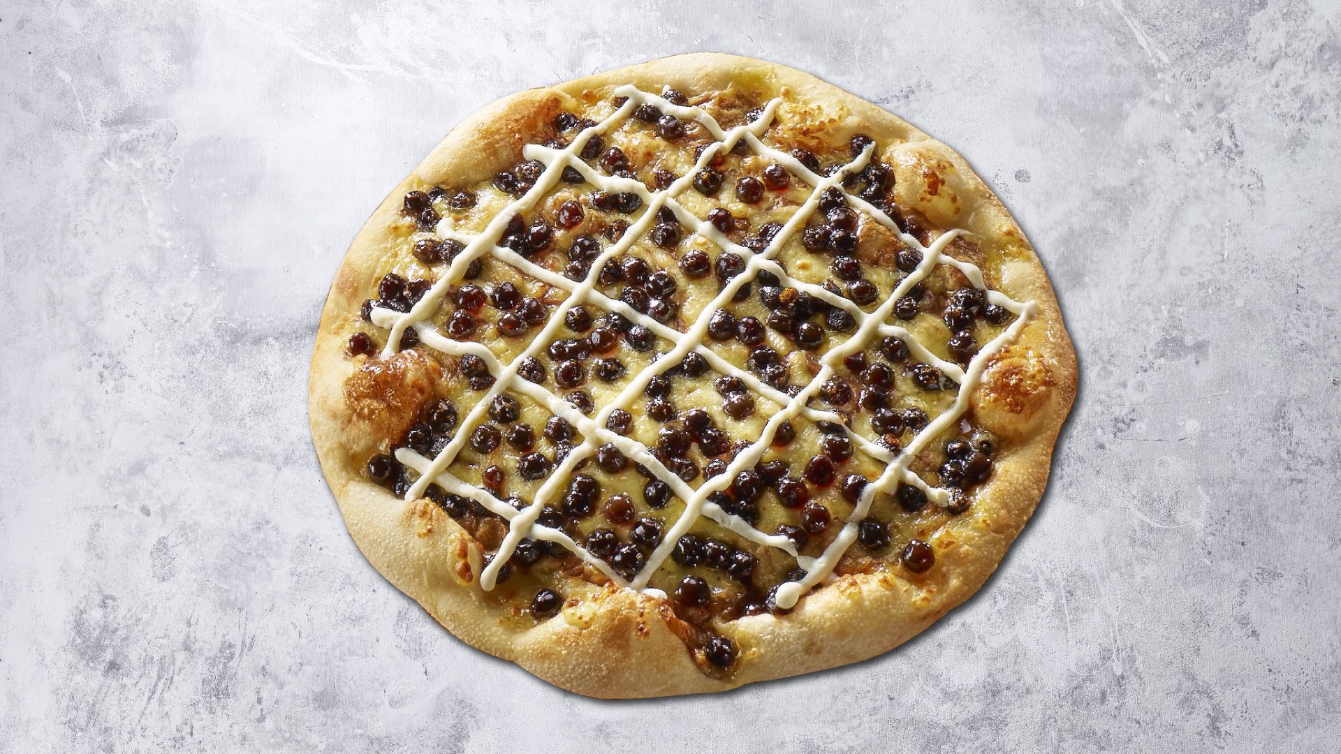 The boba pizza comes with tapioca pearls and a milk-tea drizzle.