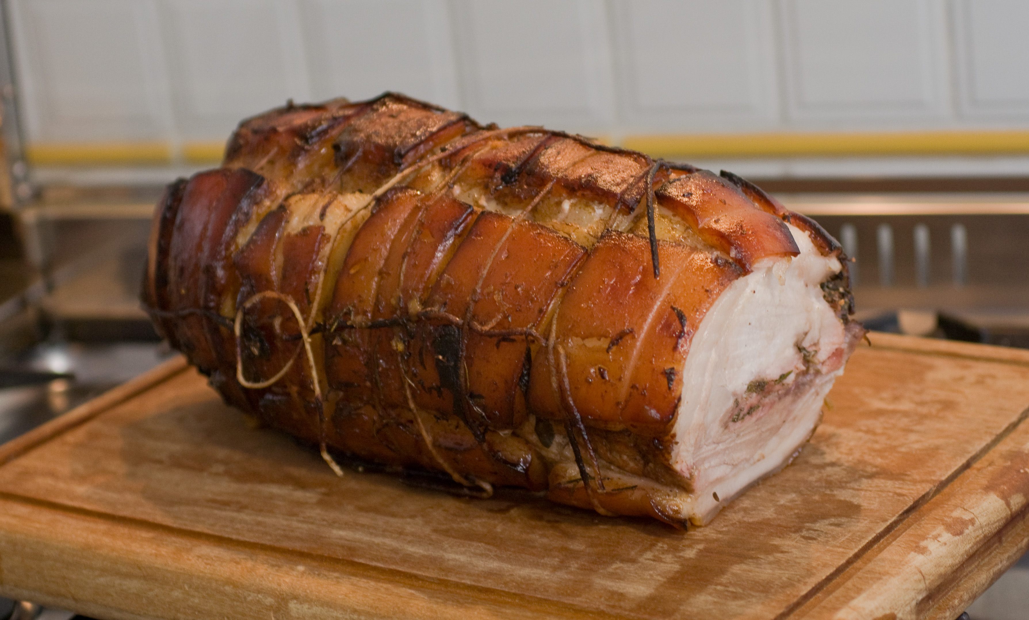 The boneless rolled pork roast <em>porchetta</em> is seasoned with coriander seeds in some regions of Italy. 