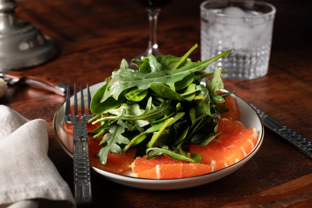 Salad of spinach, arugula and oranges with strawberry vinaigrette from...