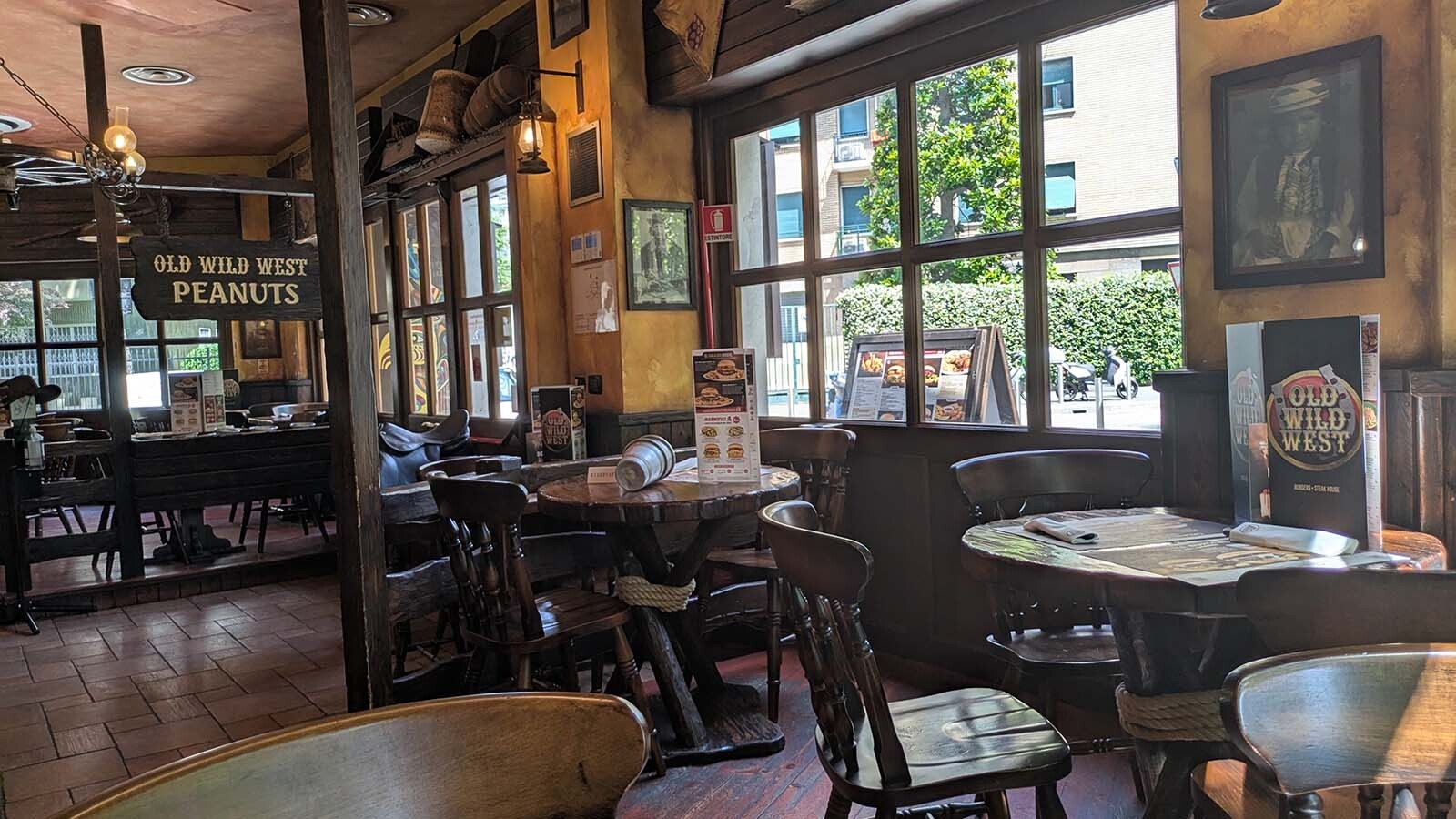 The inside of the restaurants tends toward the kitschy, with a saloon-like feel and a jumble of various Western-themed art.