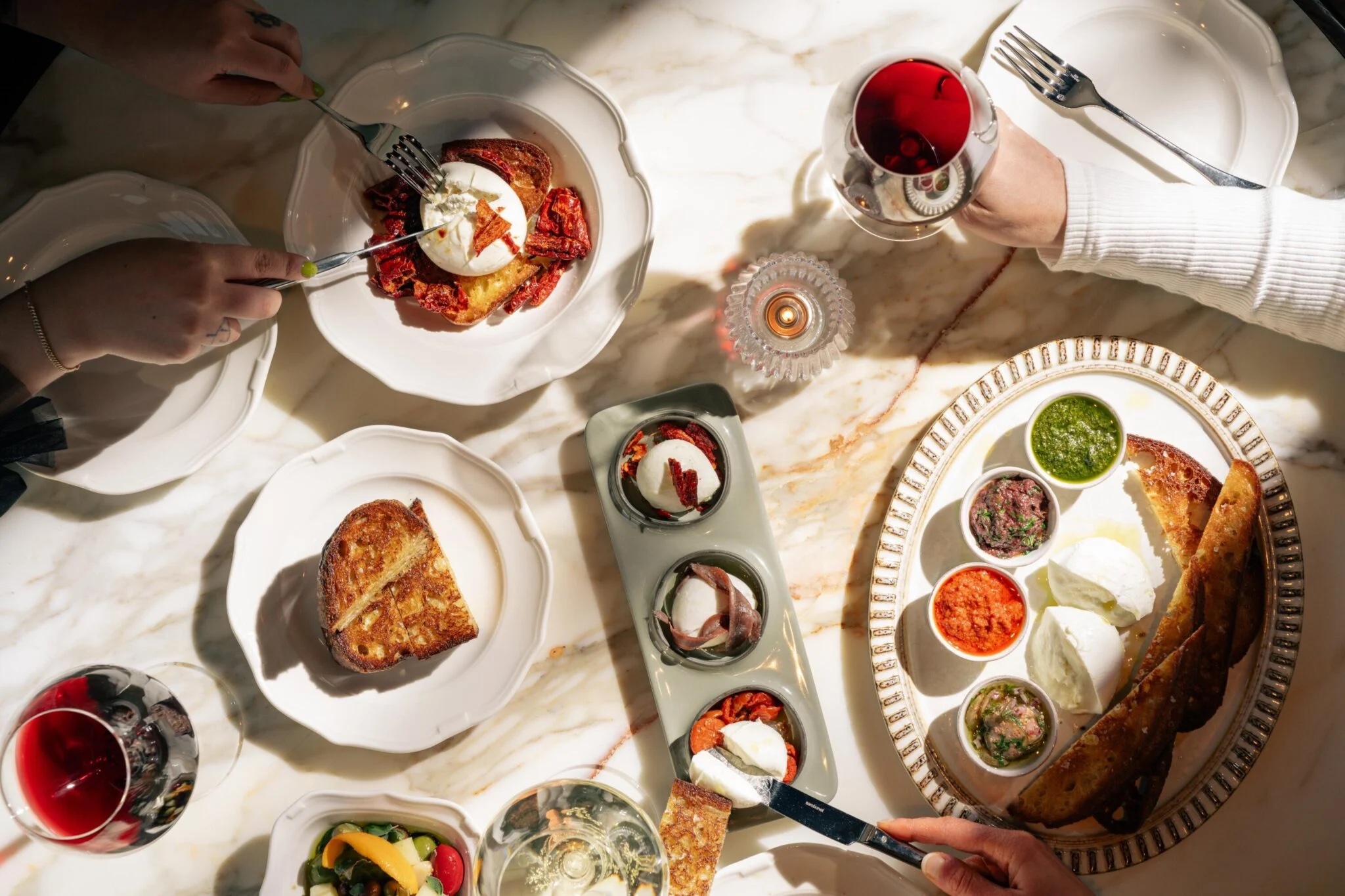 A mozzarella di buffalo trio, burrata, and ricotta combinations come from the mozzarella bar.