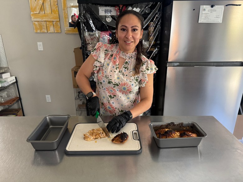 Kristina Rodriquez slicing Chicken Shawarma. Photo by Robert Eliason.