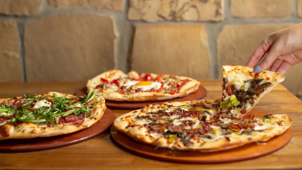 Here’s Where to Get Shareable Pizzas at Disneyland or Walt Disney World Daps Magic Logo Outline 2022