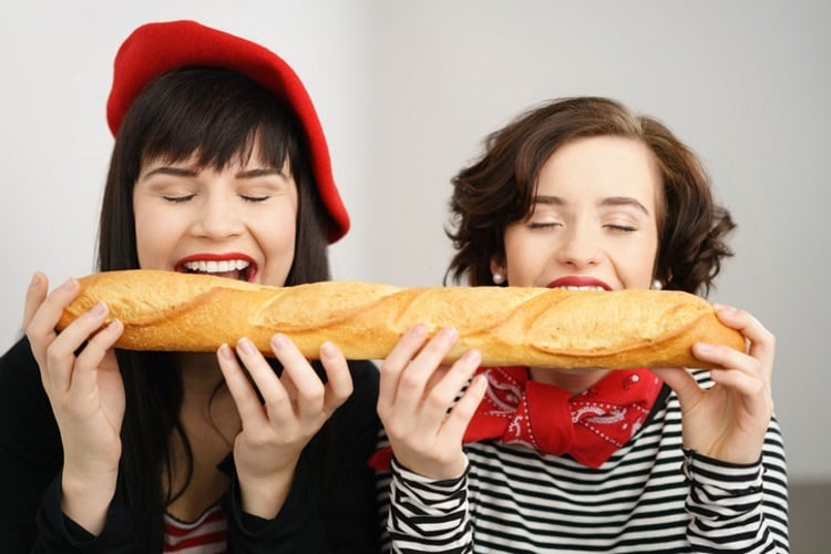 French-ladies-eating-a-baguette-stockfour.jpg