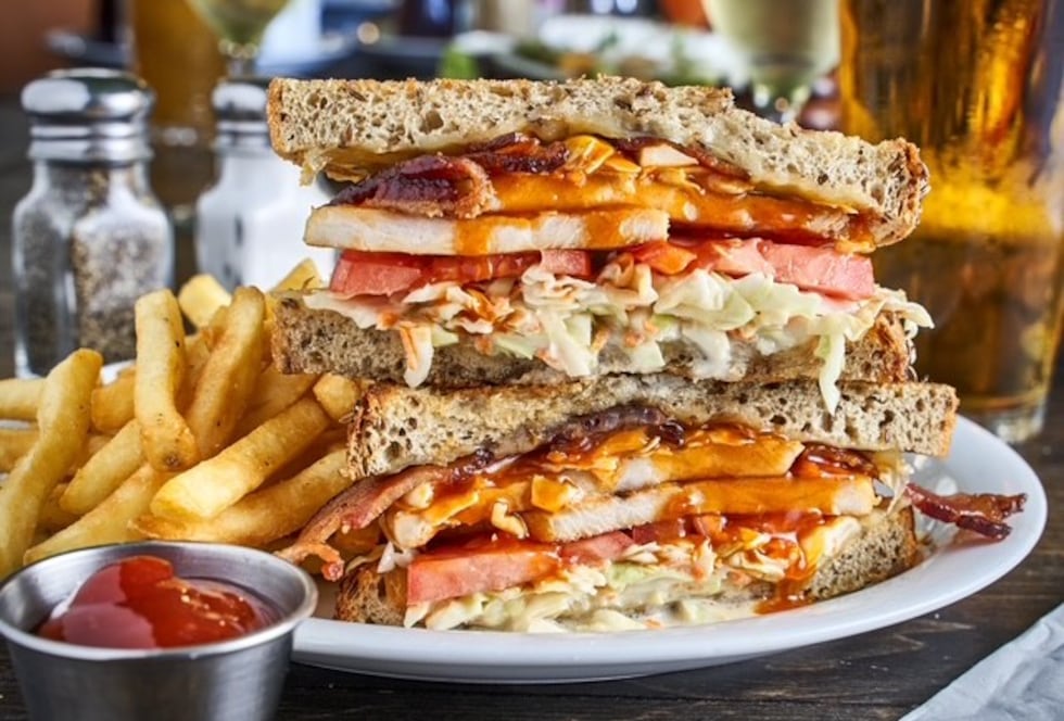 "The Mucho Smoocho" comes with roasted turkey breast, bacon, tomatoes, cole slaw, Swiss and...