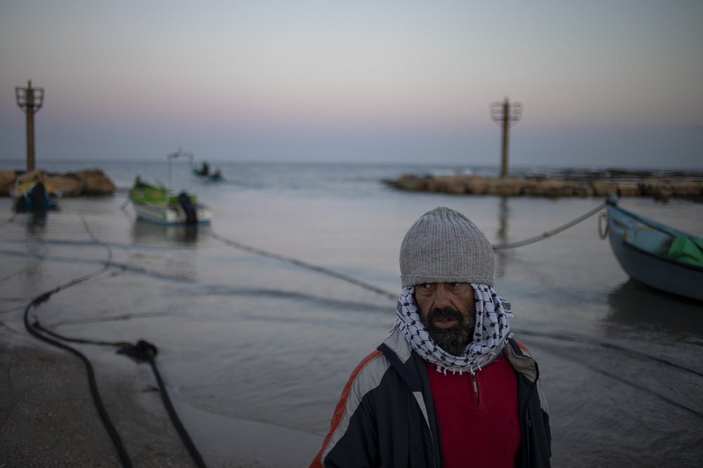 A local fisherman who goes by the name Jumbo returns from a fishing trip on the Mediterranean Sea, in the Arab village of Jisr al-Zarqa (Photo: AP) A local fisherman who goes by the name Jumbo returns from a fishing trip on the Mediterranean Sea, in the Israeli Arab village of Jisr al-Zarqa
