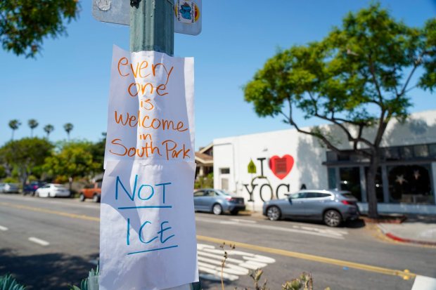 Buona Forchetta restaurant posted a message announcing all its San Diego and Orange County locations would be closed Monday and Tuesday after at least three workers were detained by immigration officers in a surprise raid Friday. Signs on a pole in South Park on 06.02.25, in San Diego, California. (Alejandro Tamayo / The San Diego Union-Tribune)