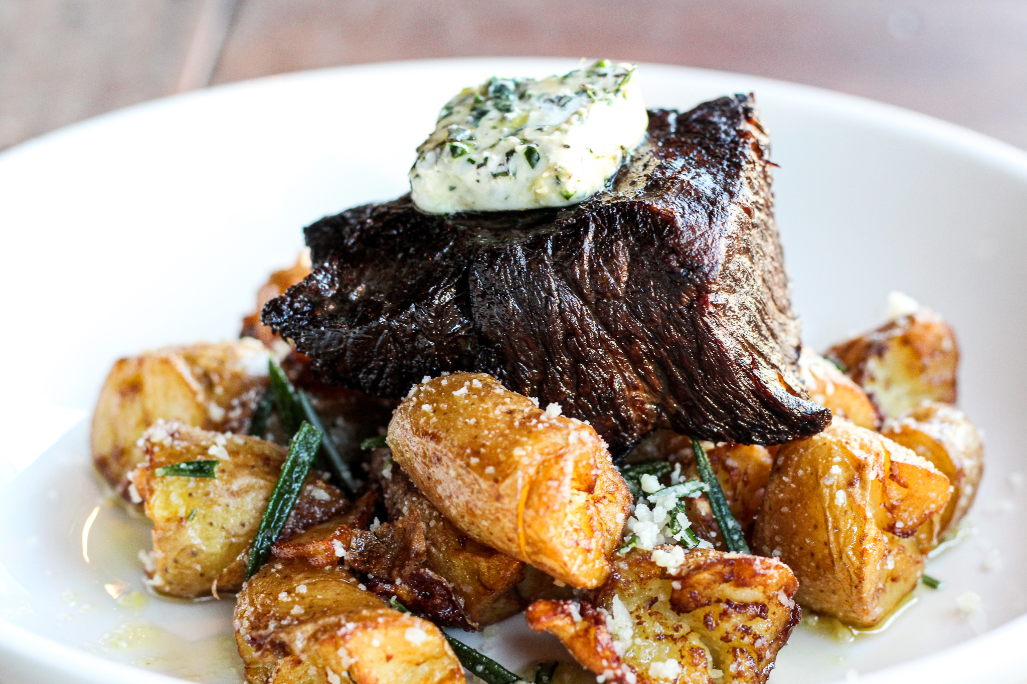 A braised and grilled short rib with fried fingerling potatoes is part of a new Tuscan pop-up at the Red Hen