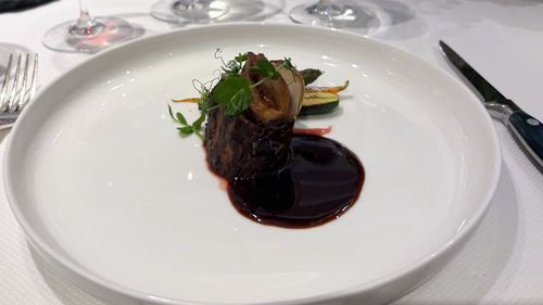 Venison filet with charred vegetables, truffle potato foam and dark chocolate jus -- the best bite of the meal.
