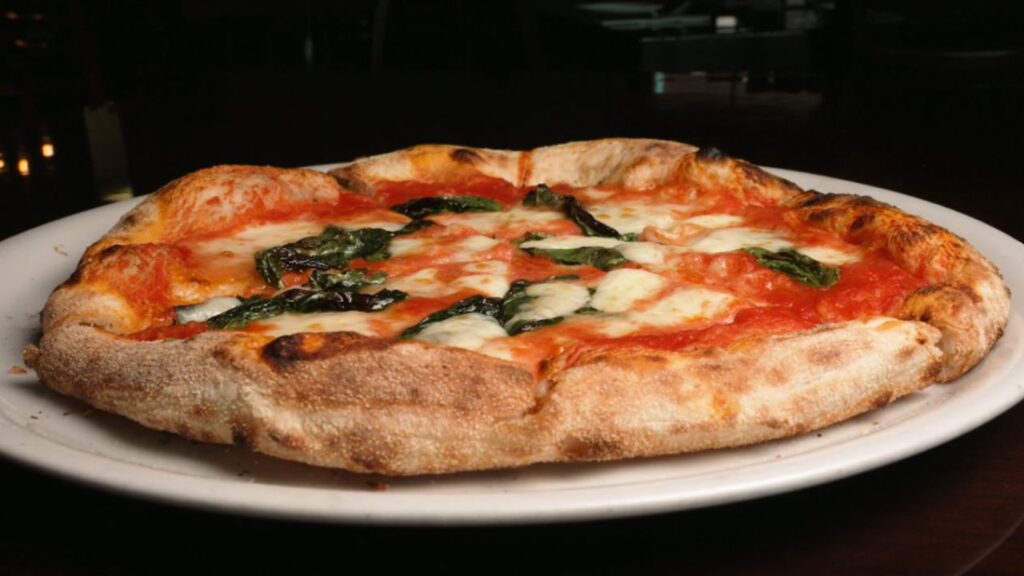 Wood-fired pizza and Italian cuisine