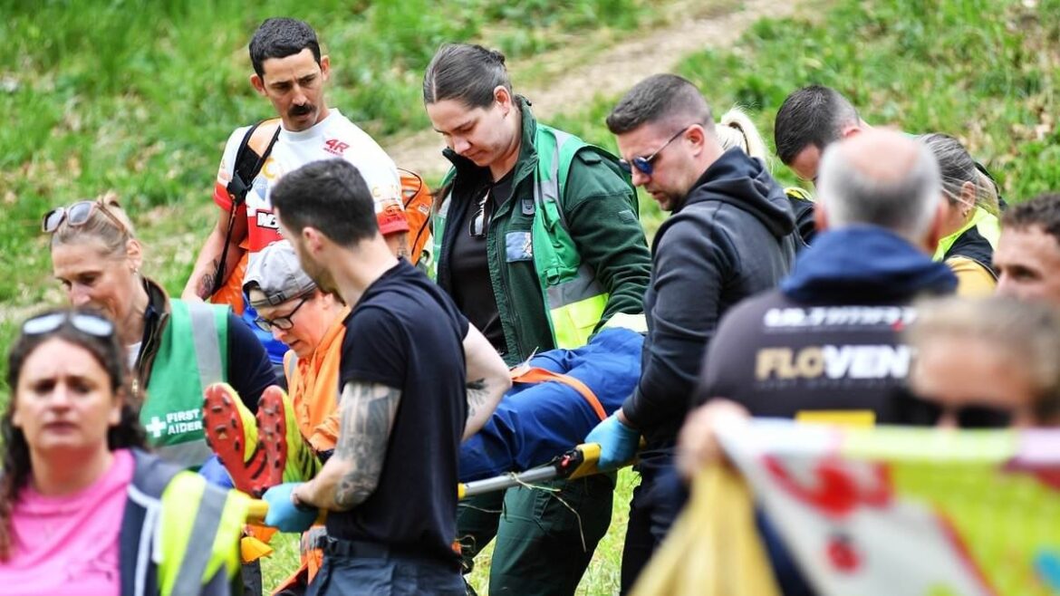 Cheese rolling competitor is taken to hospital after being injured racing after 3kg wheel of Double Gloucester in renowned Bank Holiday tradition