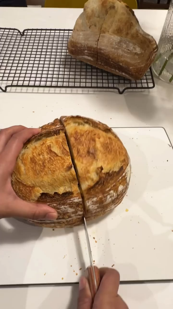 Crumb Shot w/ a bonus deformed loaf looking on.
