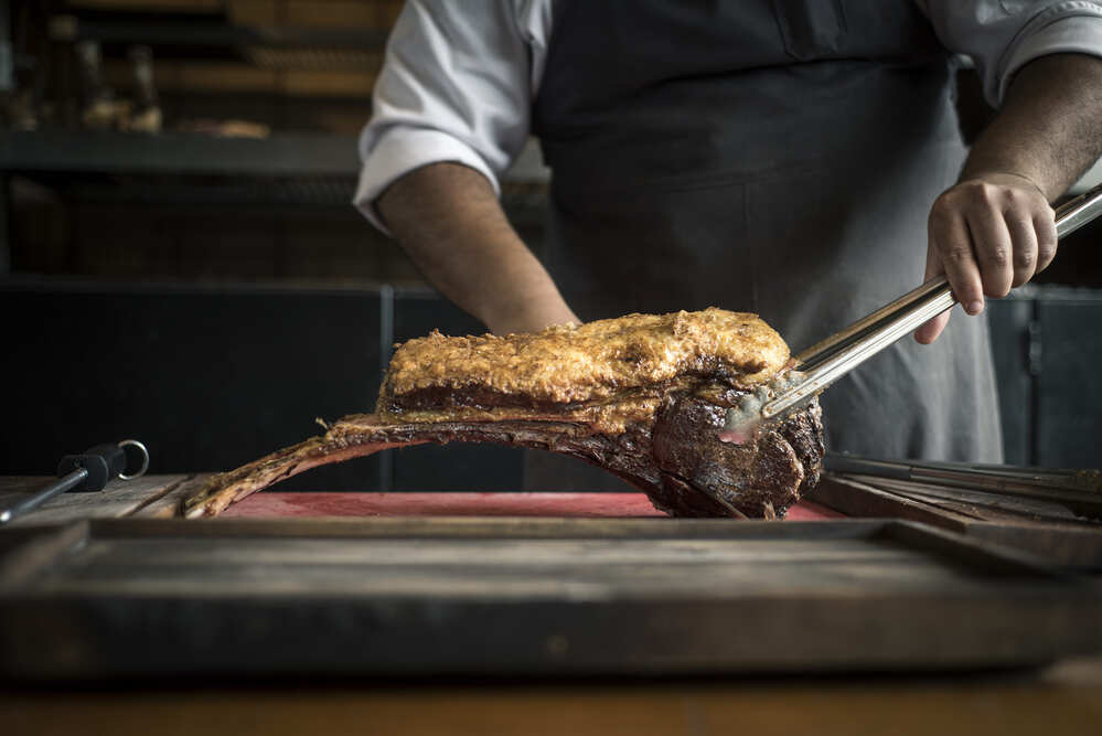 Grilled T-bone steak at Piedra Infinita Cocina © Marino Maurizi/Piedra Infinita