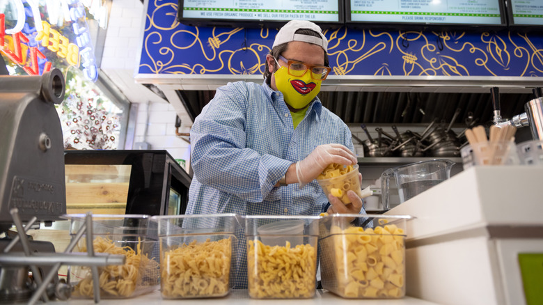 founder Brandon Fay sorting pasta