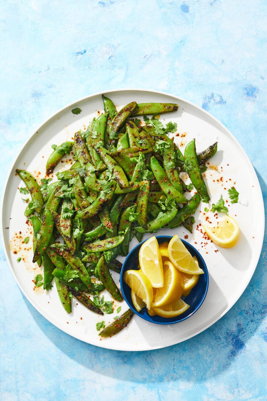 healthy italian marinated chicken over a bed of salad