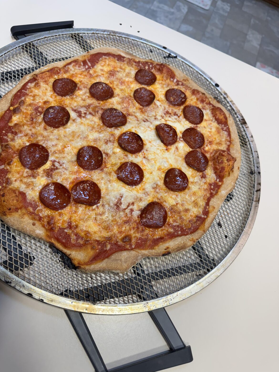 Getting better at pizza, whole wheat dough.  My kid loves it