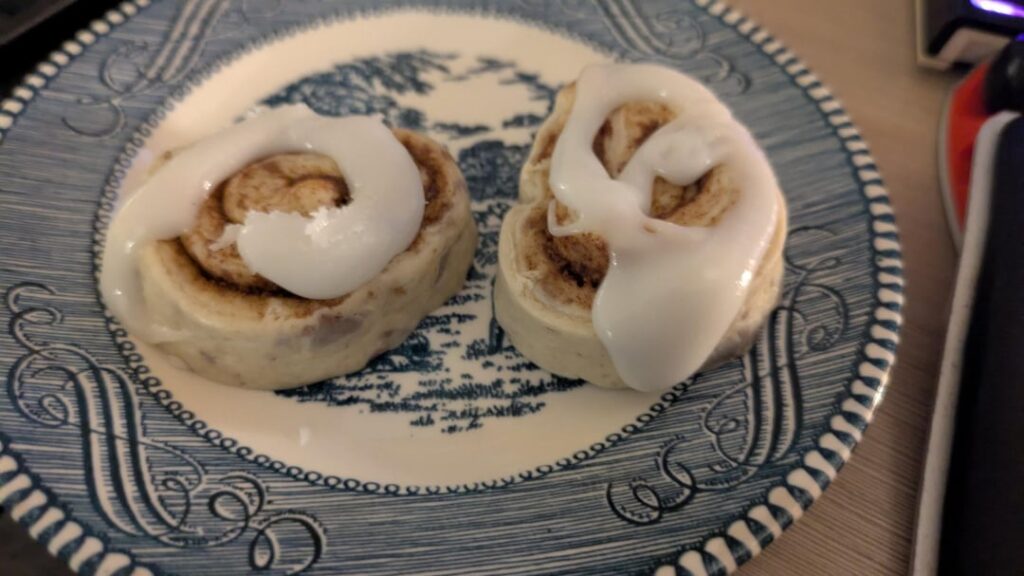 A delicacy in my household:  Uncooked cinnamon rolls from the tube, topped with frosting