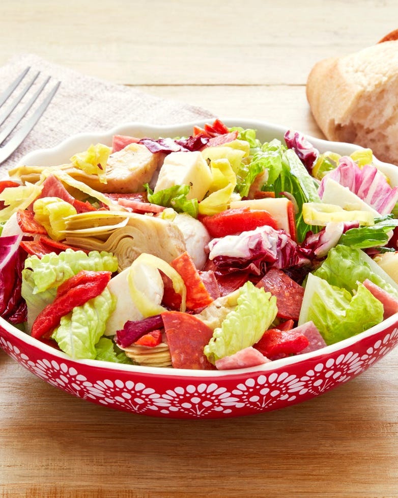 best pioneer woman salad recipes antipasti chopped salad antipasti chopped salad in red bowl with crusty bread in back