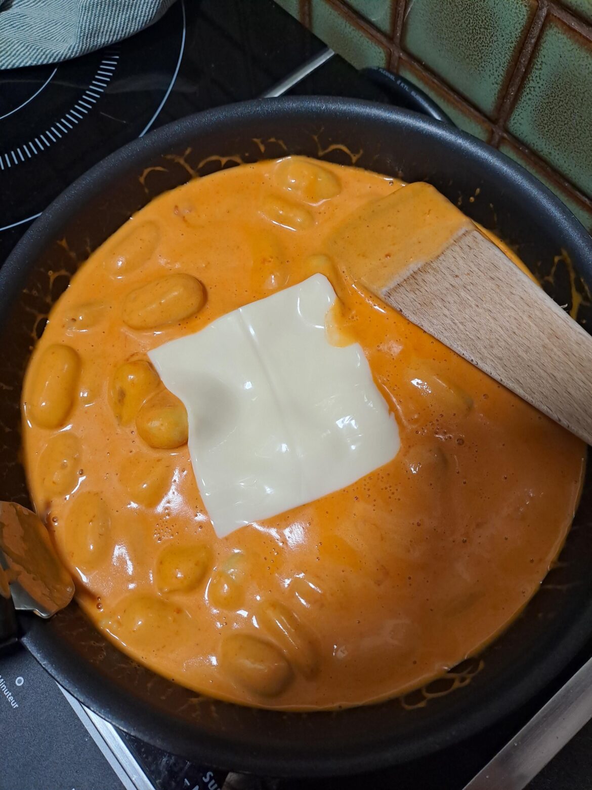 Gnocchis drowned in creamy tomato sauce