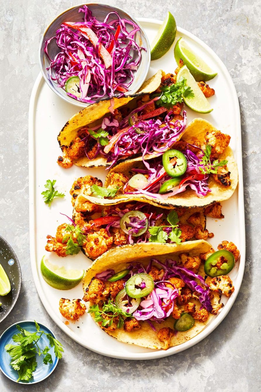 healthy italian marinated chicken over a bed of salad
