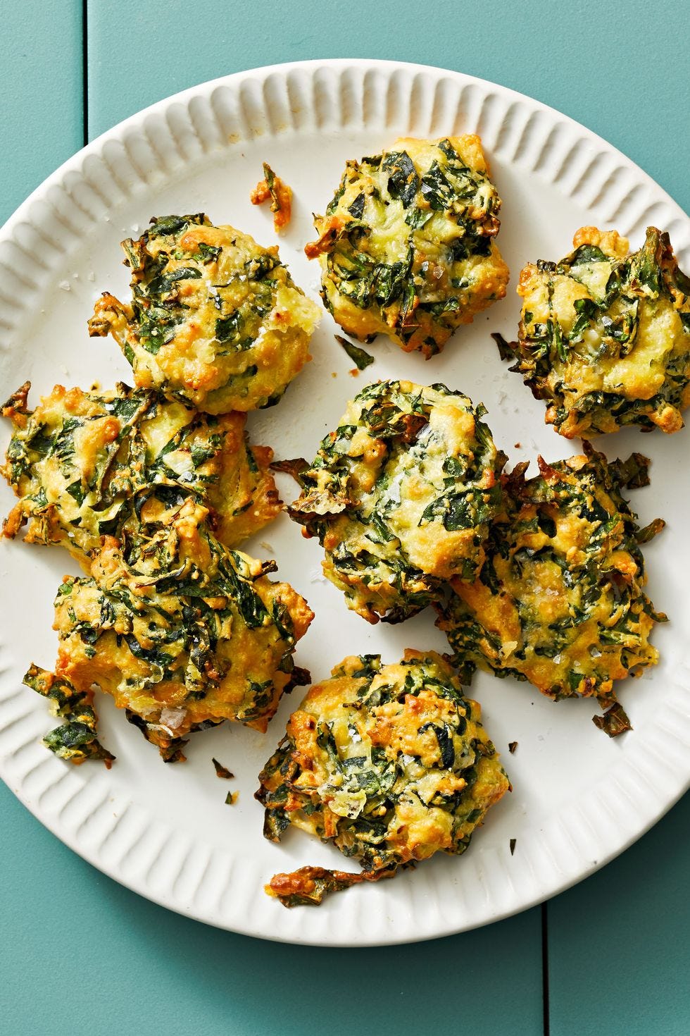 healthy air fryer cheesy kale nests on a white plate