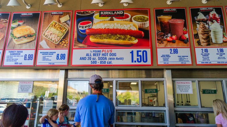 People waiting for food at a Costco food court