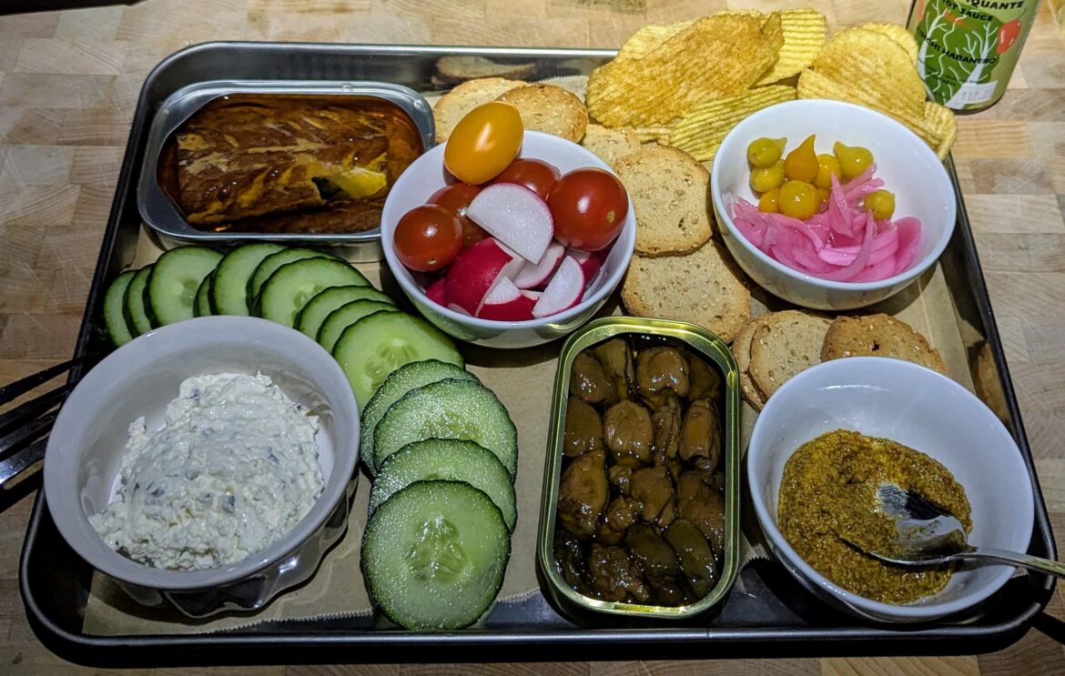 Power was out. Didn't stop us from having a cute little dinner. Canned fish rules!