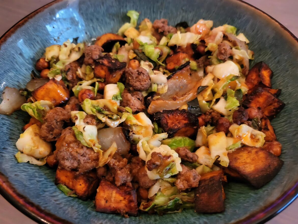 Sautéed sliced brussel sprouts, roasted sweet potato & crispy chickpeas with spiced ground lamb.