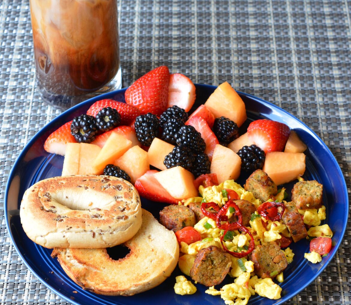 (475 cal, 36 g protein) yesterday's brunch: beyond pesto sausage + just egg scramble with fruit and protein bagel