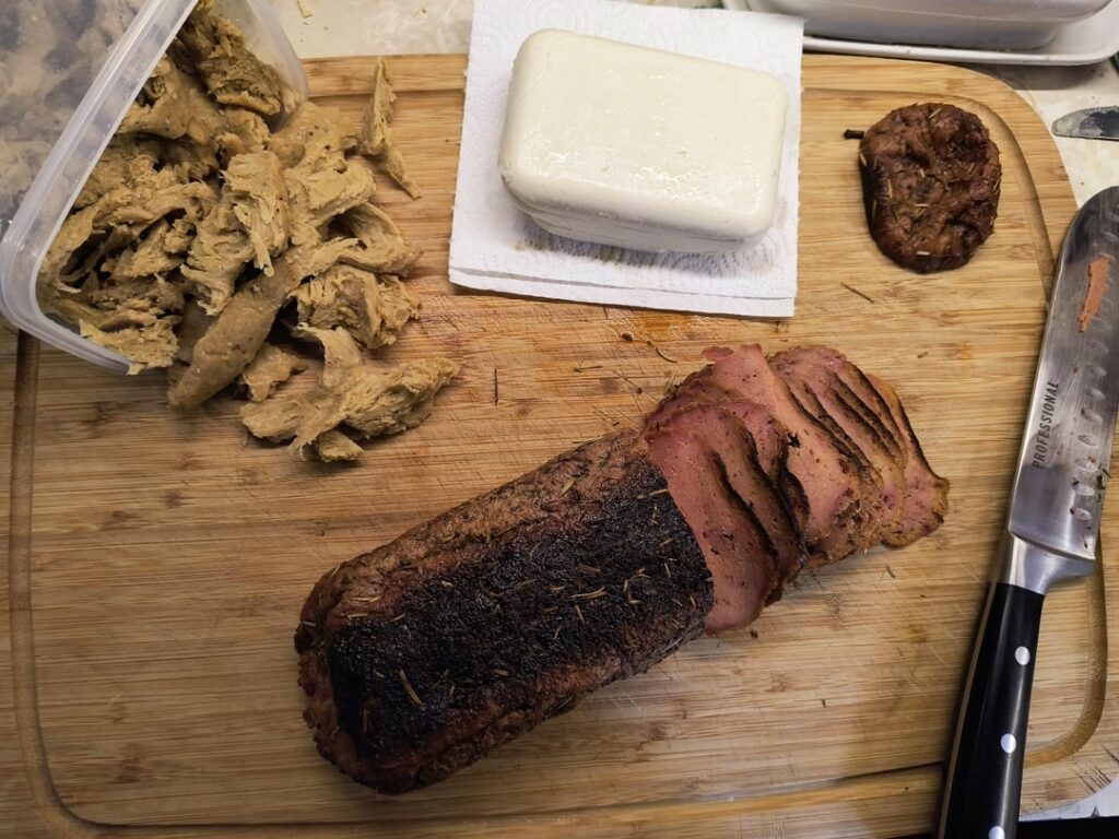 Got busy in the kitchen. Made shredded seitan chicken again, some kind of deli loaf with Seitan and tofu, a block of shreddable mozzarella. And used the chicken and cheese to make a pizza.