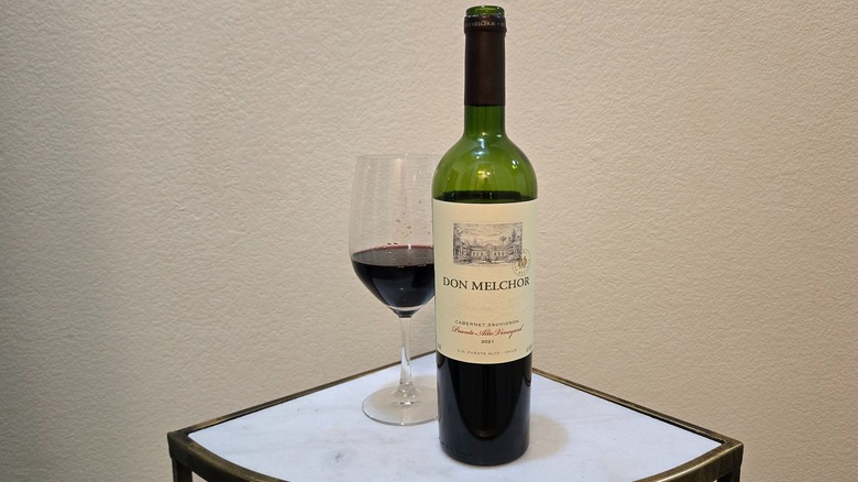 Don Melchor cabernet sauvignon and glass of wine