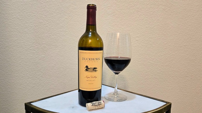 Bottle of Duckhorn merlot and glass