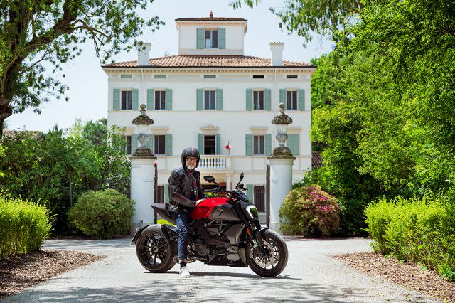 Pietro Bianchi Massimo on his Ducati outside of his estate Casa Maria Luigia.