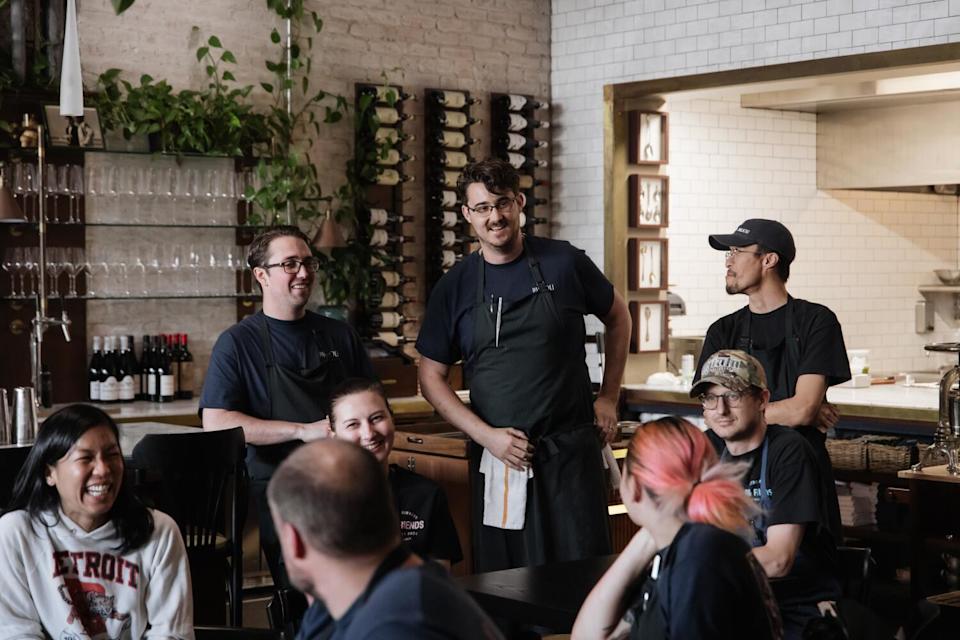 The Pasjoli team prepares for a night of friends and family service.