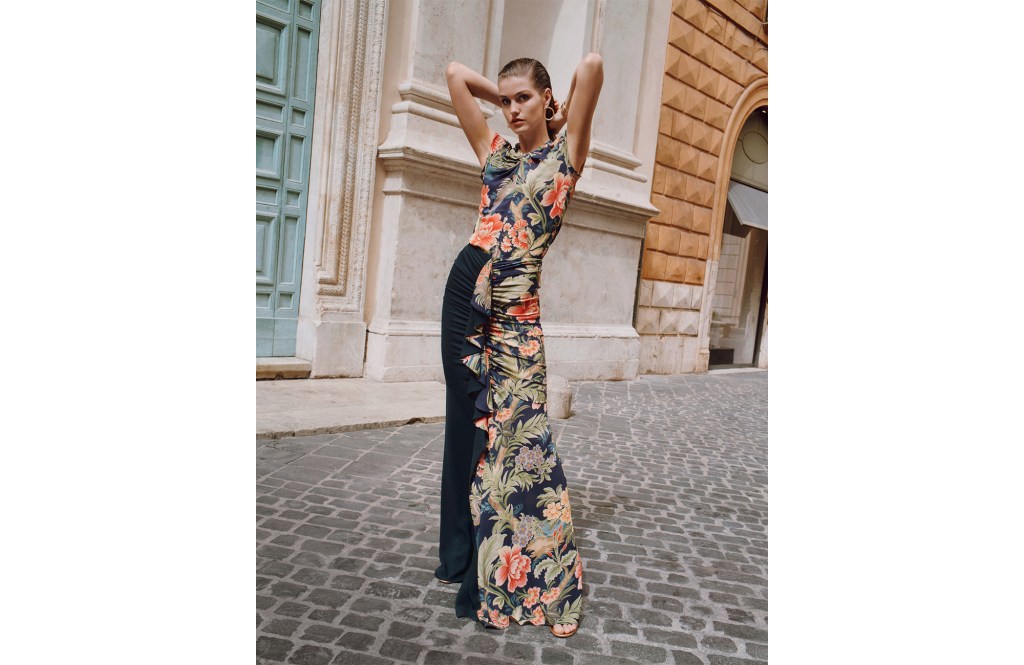 A woman posing for a picture in a Etro Set for Bloomingdale's. 