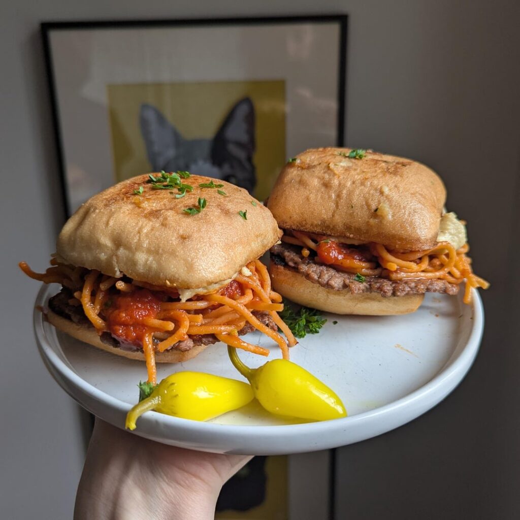 if you thought i tried too hard with the olive burgers, how about spaghetti and meatball arrabbiata smash burgers with mozzarella on garlic bread ciabatta?