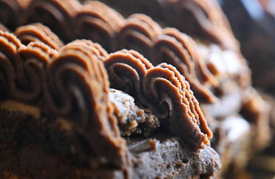 Slices of flourless chocolate cake sit in the case at Rustika Cafe & Bakery, a new bakery and cafe at Herndon and Willow avenues.