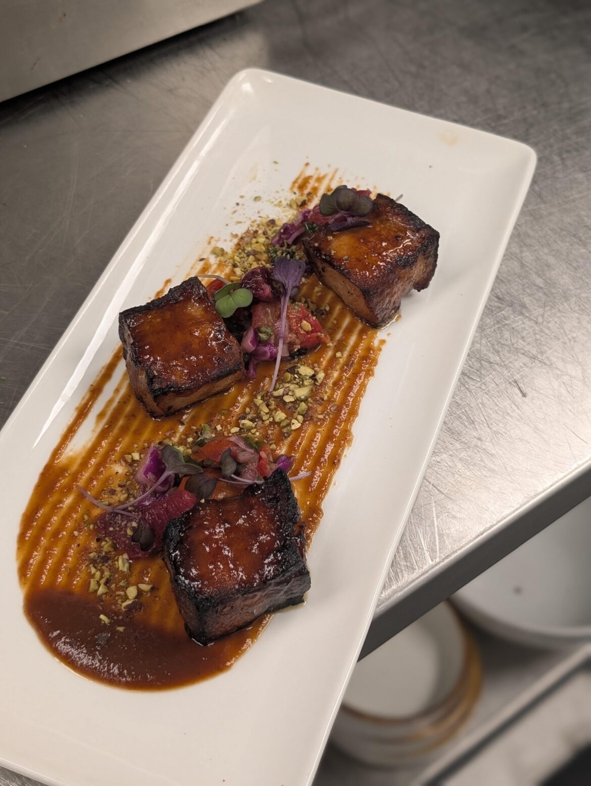 Smoked pork belly|Blood Orange BBQ|Roasted tomato Relish|Blood Orange|Pistachio