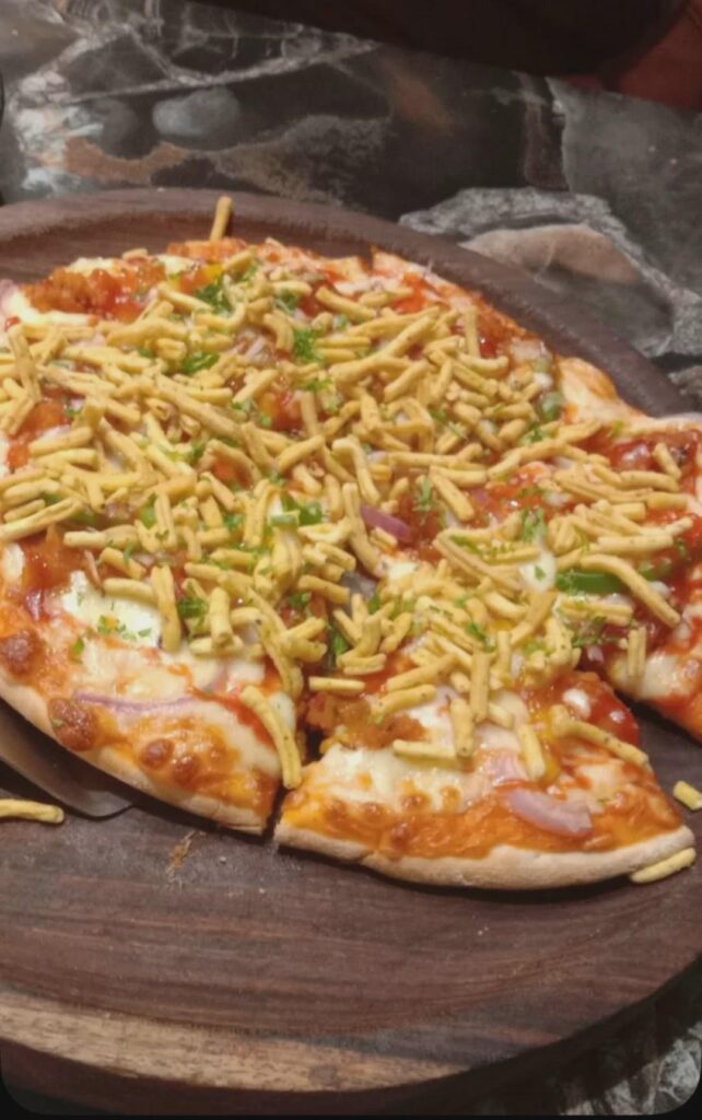 Garnishing pizza with Crunchy savory snack