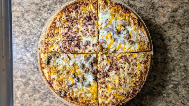 Slices of Tombstone Chili Cheese and Loaded Bacon Cheddar French Fry Style Crust Pizzas