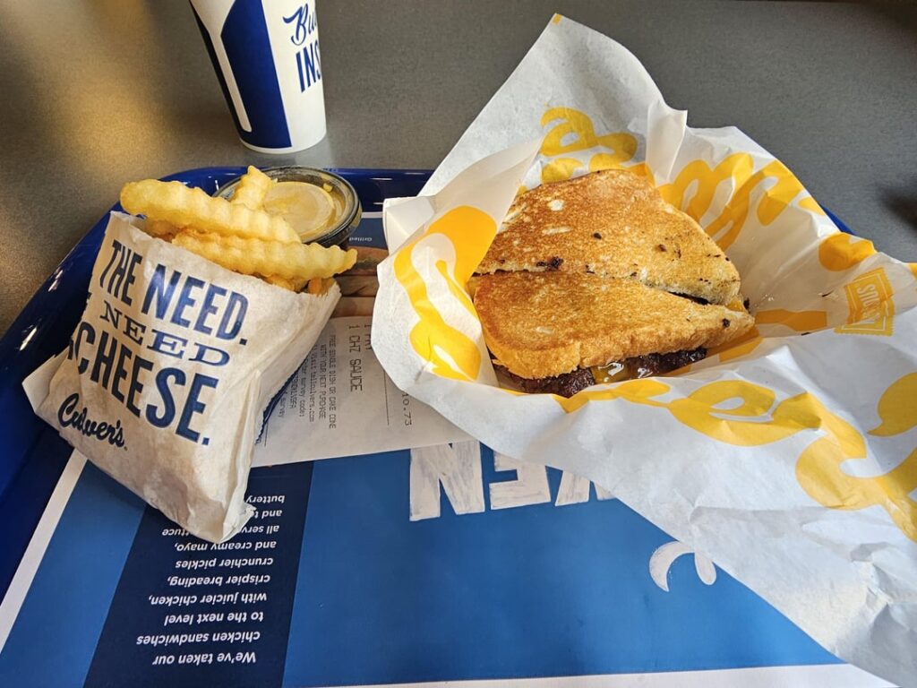 Culver's Double Sourdough Melt with fries and cheese sauce.