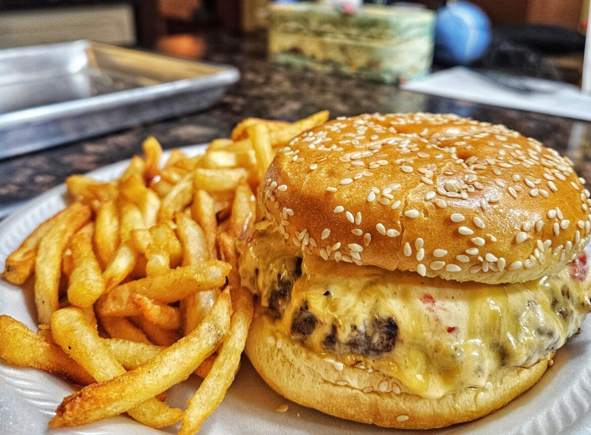 Roasted green chile pimento cheeseburger and fries.
