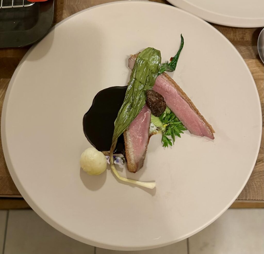 Dry-aged duck breast, morel jus, fava puree, braised hakurei turnip, sauteed ramps