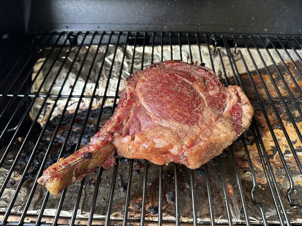 A4 Wagyu Tomahawk reverse seared on the Traeger